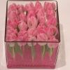 pink tulips in glass tank table floral arrangement