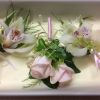 pink rose corsage and white cymbidium orchid buttonholes