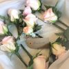 Five Arrows Waddesdon Wedding Venue rose buttonholes groom