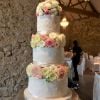 Notley Abbey wedding venue 3 tier cake fresh flowers blush ivory white rose